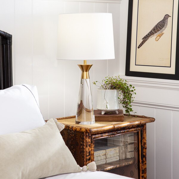 Bedroom corner with a crystal lamp and wood side table